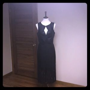 Faux leather dress with fringe bottom
